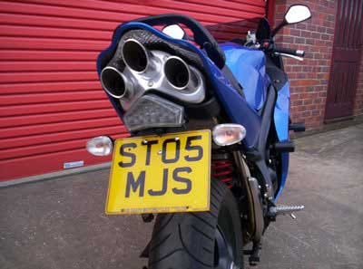 L/PLAT HOLDE TRI SPRINT ST 05-