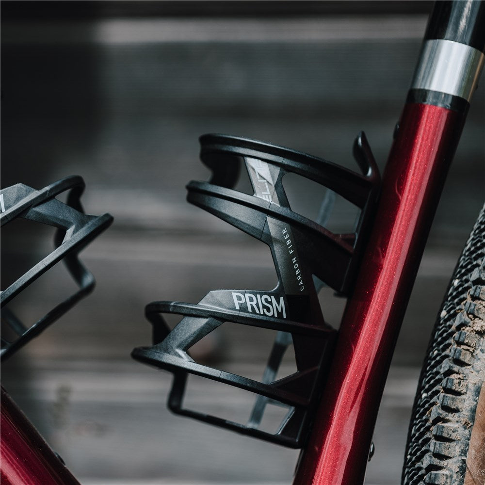 ELITE BOTTLE CAGE PRISM CARBON LEFT BLACK